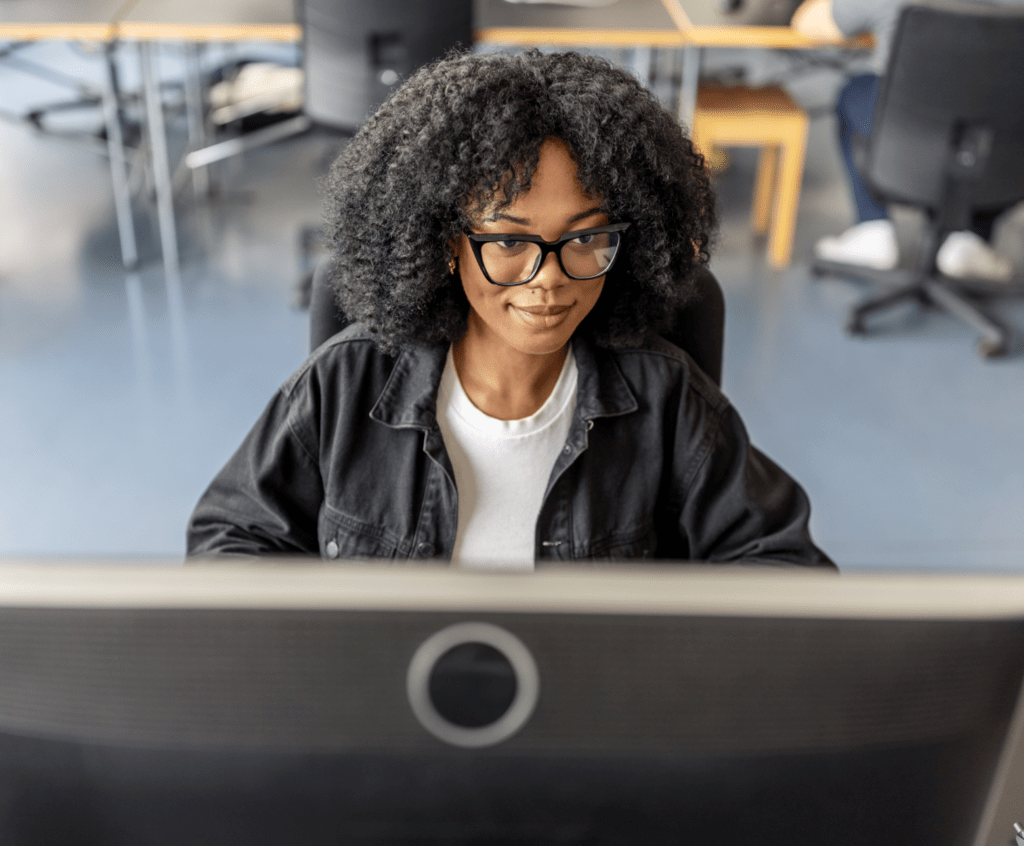 Stock image of a woman working on a computer