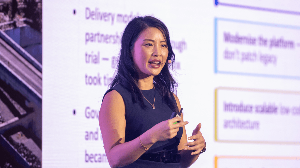 Image of Leeanne Chau giving a talk at PegaWorld