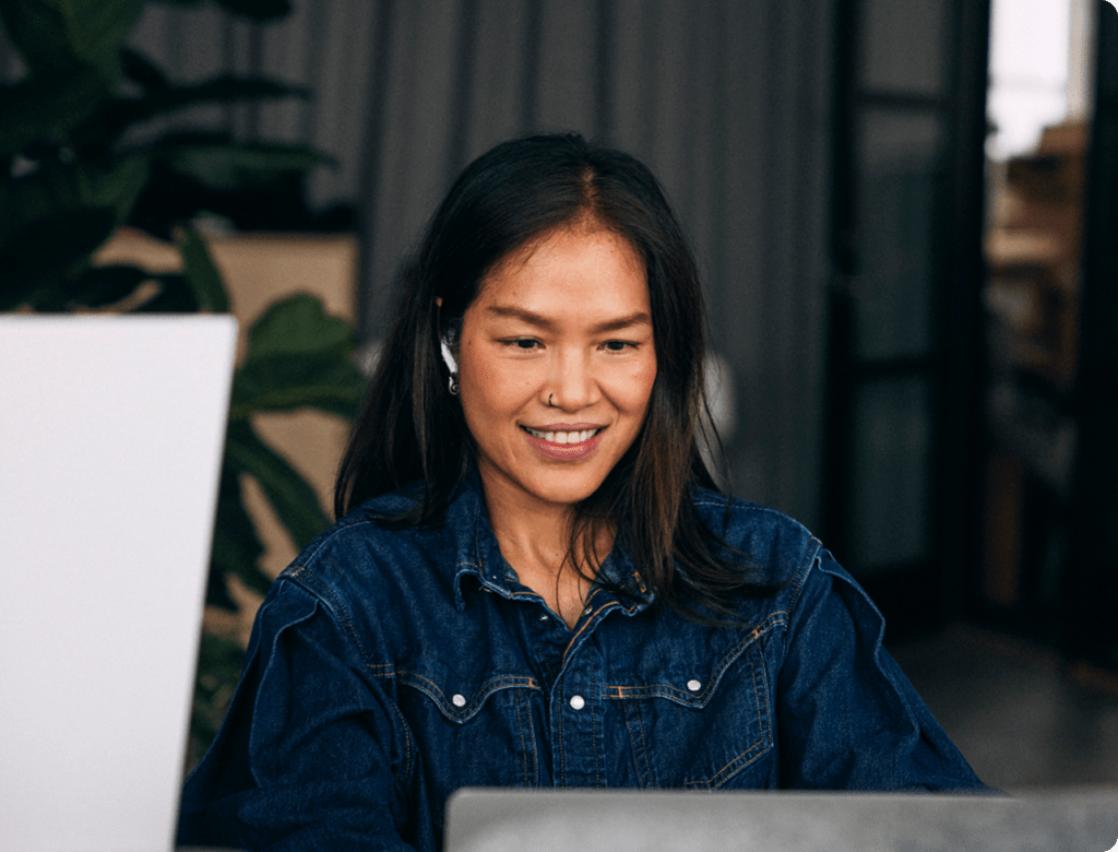 Stock image of a woman working on a computer
