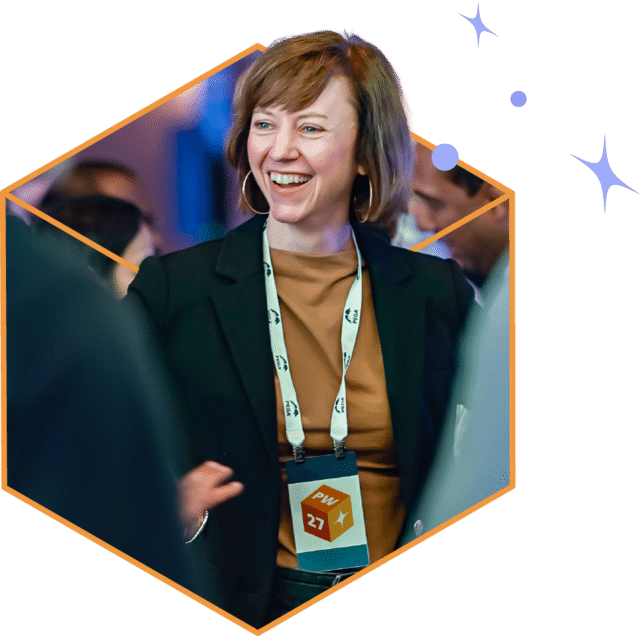 Stylized hexagonal photo of woman attending PegaWorld